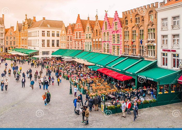 Market Square BRUGES, BELGIUM - OCTOBER 18, 2015: Market Square in Bruges with ... photo