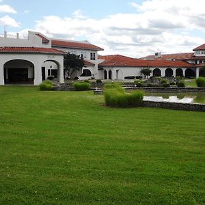 Regalia Hotel & Conference Center Village of Four Seasons Exterior photo